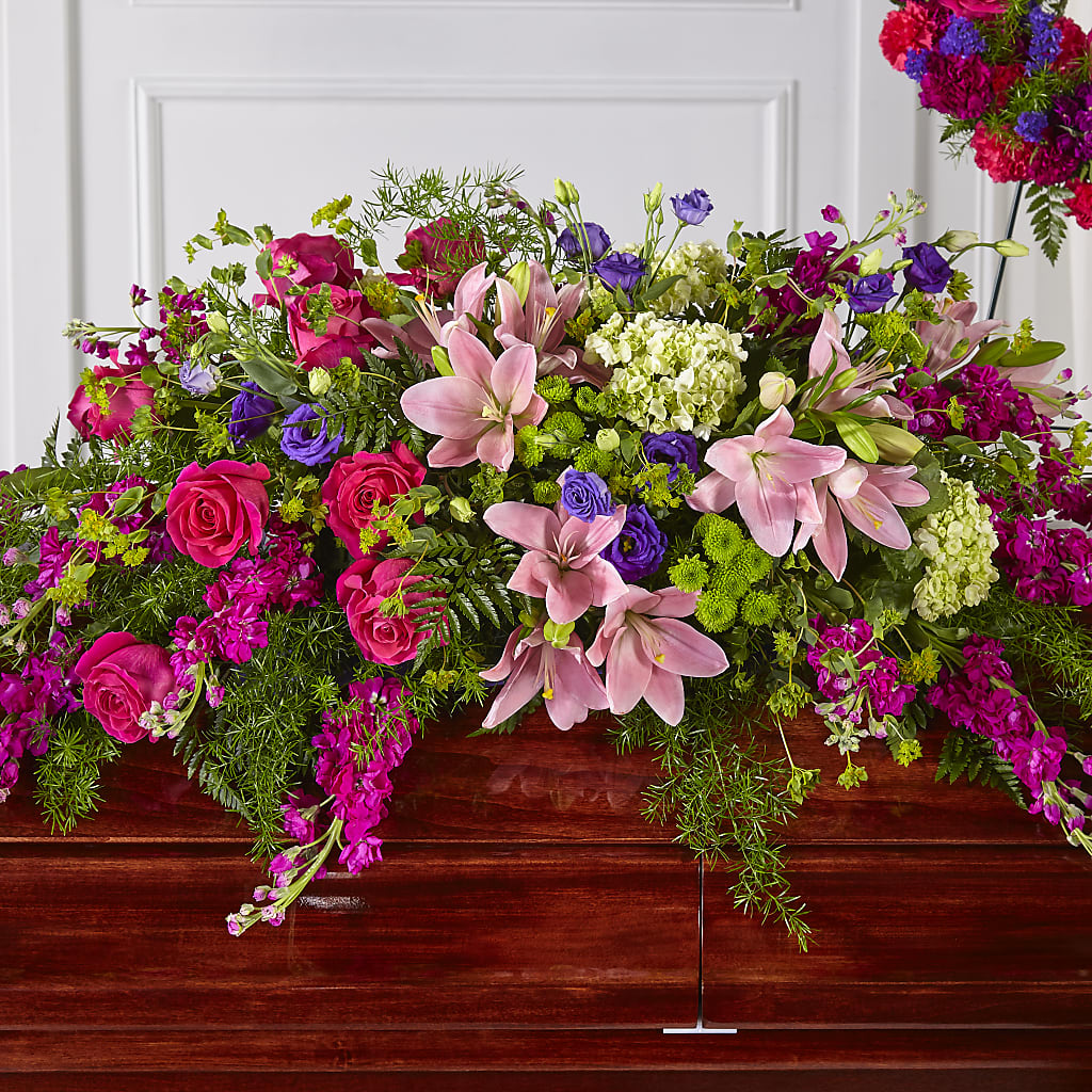 Radiant Tribute Casket Spray – Corona Rose Flowers, Corona CA