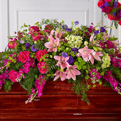 Radiant Tribute Casket Spray –  Corona Rose Flowers, Corona CA